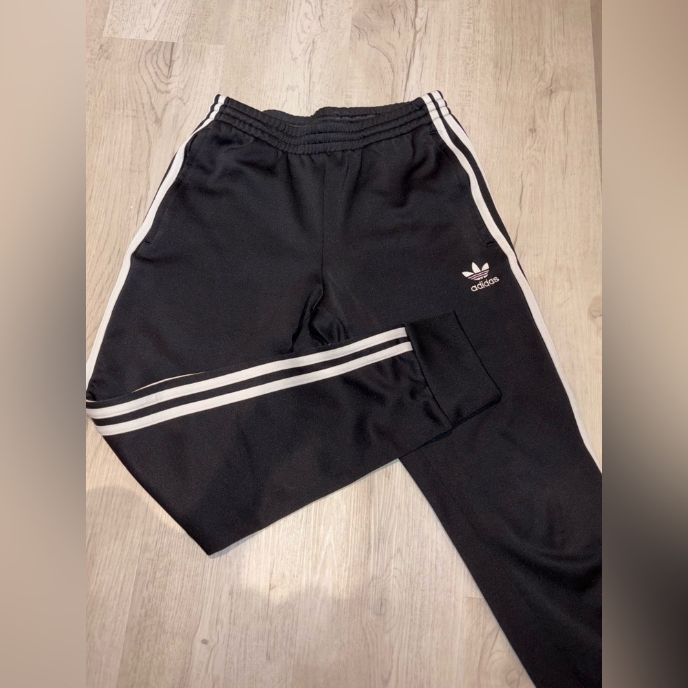 Adidas Black Sweatpants with Iconic Stripes